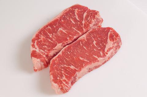 **Boneless Beef New York Strip Steaks Fireman's Cut $12.99lb